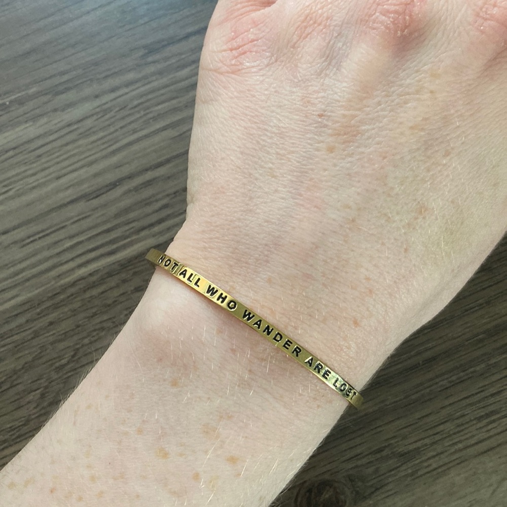Mantraband in gold: Not all who wander are lost